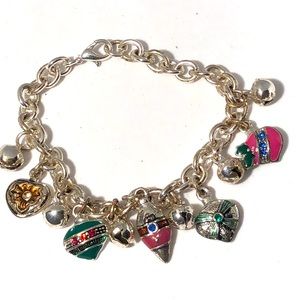 Silver tone charm bracelet with vintage Christmas Ornament Charms 7”